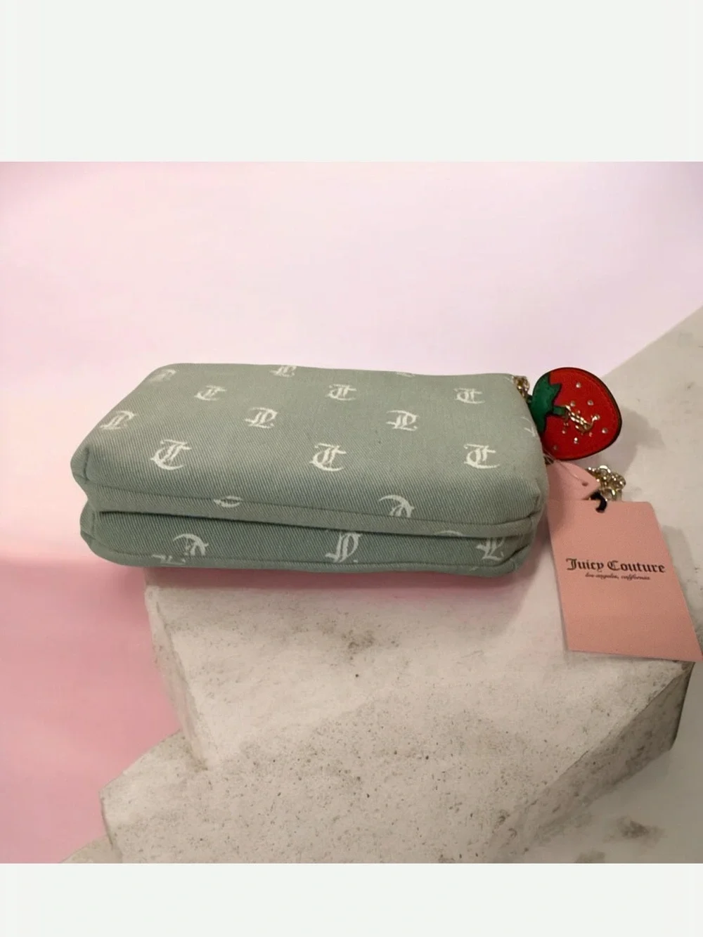 Juicy Couture light denim Monogram Canvas Wristlet with strawberry charm